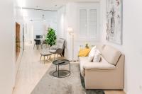 Posezení v ubytování Lujoso y amplio apartamento con parking incluido