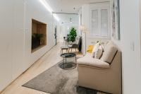 Posezení v ubytování Lujoso y amplio apartamento con parking incluido
