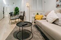 Posezení v ubytování Lujoso y amplio apartamento con parking incluido