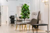 Posezení v ubytování Lujoso y amplio apartamento con parking incluido