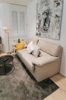 Posezení v ubytování Lujoso y amplio apartamento con parking incluido
