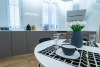Kuchyň nebo kuchyňský kout v ubytování Lujoso y amplio apartamento con parking incluido