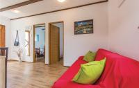 Televízia a/alebo spoločenská miestnosť v ubytovaní Holiday Home Peroj I