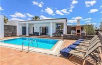 The swimming pool at or close to Nice Home In Playa Blanca With Sauna