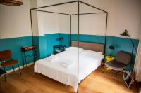 A bed or beds in a room at La Donota