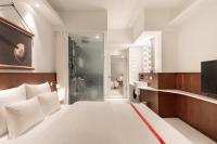 Ruby Luna Hotel Dusseldorfにあるベッド