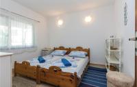 Postel nebo postele na pokoji v ubytování Holiday Home Privlaka Put Grzanove Punte