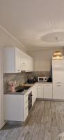 A kitchen or kitchenette at Residenza Il Principe Bilocale Centro