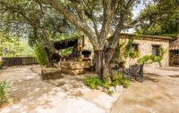 A garden outside Cozy Home In Algatocin With Kitchenette