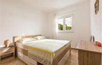 Posteľ alebo postele v izbe v ubytovaní Three-Bedroom Apartment In Komarna