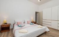Posteľ alebo postele v izbe v ubytovaní Nice Apartment In Mali Losinj With Wifi