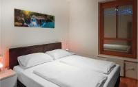 A bed or beds in a room at Ferienwohnung Auf 2 Etagen