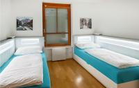 A bed or beds in a room at Ferienwohnung Auf 2 Etagen