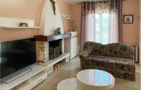TV a/nebo společenská místnost v ubytování 3 Bedroom Awesome Home In Splitska