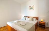 Posteľ alebo postele v izbe v ubytovaní Apartment Podstrana 3