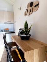 Kuchyň nebo kuchyňský kout v ubytování Del Sol Suites