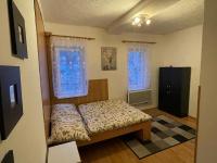 Postel nebo postele na pokoji v ubytování Horský apartmán