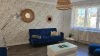 Posezení v ubytování Spacieux appartement au pied de la cité médiévale
