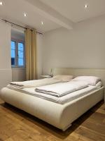 Posteľ alebo postele v izbe v ubytovaní REMA Apartments 1070