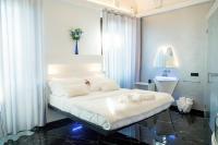 A bed or beds in a room at Inferno e Paradiso