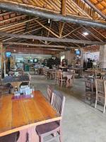 Restaurace v ubytování Delícias da Tilápia em Domingos Martins ES