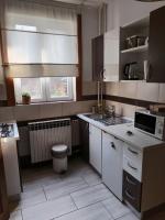 Kuchyňa alebo kuchynka v ubytovaní Apartmani Stonewood