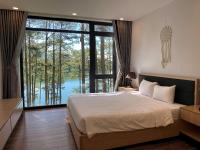Ein Bett oder Betten in einem Zimmer der Unterkunft Lan Anh Villas Resort