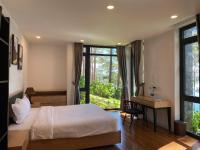 Ein Bett oder Betten in einem Zimmer der Unterkunft Lan Anh Villas Resort