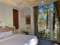 Ein Bett oder Betten in einem Zimmer der Unterkunft Lan Anh Villas Resort