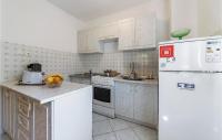 Kuchyňa alebo kuchynka v ubytovaní Holiday Home Kapelica Ix Cr