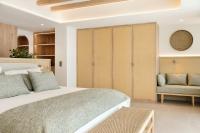 Łóżko lub łóżka w pokoju w obiekcie Iberostar Selection Es Trenc -New Opening-
