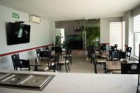 TV a/nebo společenská místnost v ubytování Apple Inn