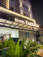 a hotel emergency sign in front of a building at Hotel Emerald in Visakhapatnam
