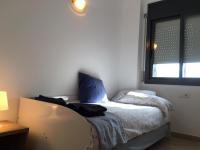 Postel nebo postele na pokoji v ubytování New & Sunny Apartment