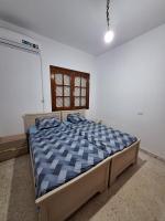 Postel nebo postele na pokoji v ubytování Apartment in Monastir