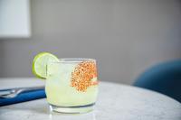 a glass filled with a drink with a lime at The Westin La Paloma Resort & Spa in Tucson
