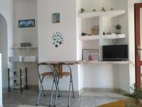 Televízia a/alebo spoločenská miestnosť v ubytovaní Apartments Desa