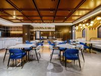 Un restaurante u otro lugar para comer en Hilton Garden Inn Beijing Guomao