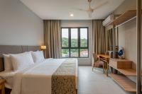 Ein Bett oder Betten in einem Zimmer der Unterkunft Zenith Suites Cameron