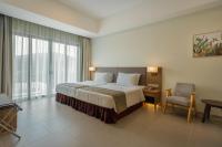Ein Bett oder Betten in einem Zimmer der Unterkunft Zenith Suites Cameron