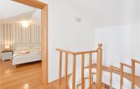 Posteľ alebo postele v izbe v ubytovaní Two-Bedroom Apartment In Stanici