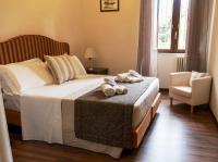 A bed or beds in a room at Villa Siciliana