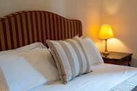 A bed or beds in a room at Villa Siciliana