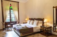 A bed or beds in a room at Villa Siciliana