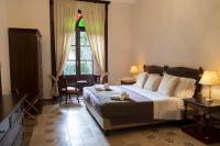 A bed or beds in a room at Villa Siciliana