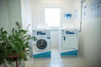 a washing machine and a dryer in a room at ibis Itu Plaza Shopping in Itu