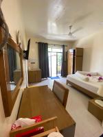 Postel nebo postele na pokoji v ubytování Maavaharu Guest House Himmafushi
