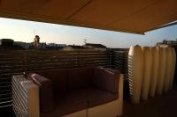 a couch sitting on top of a roof at Salamanca Suite Studios in Salamanca