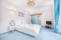 Łóżko lub łóżka w pokoju w obiekcie Żabi Dwór - HOTEL - RESTAURACJA - SPA