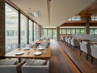 Un restaurant u otro lugar para comer en アドベンチャーズアイランド 小谷流沢ロッジ